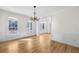 Bright dining room with hardwood floors, large windows and classic trim at 1584 Fernstone Nw Cir, Acworth, GA 30101