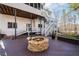 Gorgeous outdoor entertaining area with deck and stone fire pit at 1584 Fernstone Nw Cir, Acworth, GA 30101