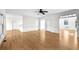 Open living space with hardwood flooring, white trim, and abundant natural light at 1584 Fernstone Nw Cir, Acworth, GA 30101