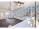 Enclosed porch with suspended porch swing, offering serene views of surrounding nature at 1584 Fernstone Nw Cir, Acworth, GA 30101