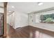 Bright living room featuring hardwood floors and a large window at 1652 Detroit Nw Ave, Atlanta, GA 30314