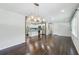 Open layout connects living room to kitchen, with stainless appliances and a kitchen island at 1652 Detroit Nw Ave, Atlanta, GA 30314