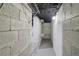 A utility room with wire shelving units and painted concrete block walls at 1652 Detroit Nw Ave, Atlanta, GA 30314