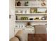 Close-up of a dining room's built-in shelves, showcasing curated decor and stylish accents at 266 Adair St, Decatur, GA 30030