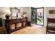 Inviting foyer featuring hardwood floors and a classic console table at 266 Adair St, Decatur, GA 30030