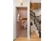 View of the stairwell and hallway with adjacent ' playroom, complete with a miniature play kitchen at 266 Adair St, Decatur, GA 30030