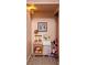 Charming ' playroom with a faux play kitchen, soft rug, framed art, and ample toy storage at 266 Adair St, Decatur, GA 30030