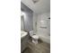 Bathroom with updated fixtures, neutral tile floors, and a tiled shower-tub combo at 3065 Ashly Pines Dr, Snellville, GA 30078