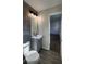 Nicely remodeled bathroom featuring a vanity, modern floors and paint at 3065 Ashly Pines Dr, Snellville, GA 30078