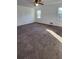 Large bedroom with carpet, a ceiling fan, and windows for natural light at 3065 Ashly Pines Dr, Snellville, GA 30078