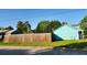 Exterior backyard view of home showing the wood fence and house siding at 3065 Ashly Pines Dr, Snellville, GA 30078