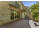 A home's backyard featuring a spacious deck perfect for outdoor relaxation and entertaining at 1290 Fernwood Ne Cir, Brookhaven, GA 30319