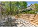 Landscaped backyard with patio and walkways offering a tranquil outdoor space at 1290 Fernwood Ne Cir, Brookhaven, GA 30319