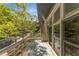 Relaxing balcony area with outdoor views, accessible through sliding glass doors at 1290 Fernwood Ne Cir, Brookhaven, GA 30319