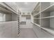 Spacious walk-in closet with custom shelving and ample storage space at 1290 Fernwood Ne Cir, Brookhaven, GA 30319