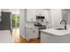 Bright kitchen featuring white cabinetry, subway tile backsplash, and stainless steel appliances at 1290 Fernwood Ne Cir, Brookhaven, GA 30319