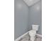 A newly remodeled bathroom features a toilet, a commode and marble floors at 3463 Chastain Glen Ne Ln, Marietta, GA 30066