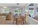 Eat-in kitchen features an open concept view of the living room and lots of natural light at 3463 Chastain Glen Ne Ln, Marietta, GA 30066