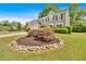 Charming two-story home with a manicured lawn, attractive landscaping, and a classic exterior, enhancing curb appeal and inviting entry at 3463 Chastain Glen Ne Ln, Marietta, GA 30066