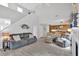 Bright living room with high ceilings, fireplace, and open access to the eat-in kitchen at 3463 Chastain Glen Ne Ln, Marietta, GA 30066