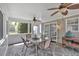 Sunroom boasting stone flooring, lots of windows, and outdoor access at 3463 Chastain Glen Ne Ln, Marietta, GA 30066