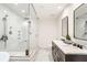 Spacious bathroom features a dual sink vanity, glass enclosed shower with dual shower heads at 4094 Norton Se Pl, Smyrna, GA 30082