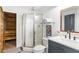 Modern bathroom featuring a walk-in shower, vanity, and a sauna for a spa-like experience at 4094 Norton Se Pl, Smyrna, GA 30082
