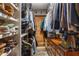 Walk-in closet with custom shelving and storage space for organizing clothes and accessories at 4094 Norton Se Pl, Smyrna, GA 30082