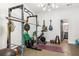 Finished basement featuring an in-home gym, equipped with weights and exercise equipment at 4094 Norton Se Pl, Smyrna, GA 30082