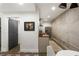 Modern kitchen with stainless steel appliances and a sleek design, seamlessly connected to the dining area at 4094 Norton Se Pl, Smyrna, GA 30082
