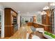 Spacious kitchen with hardwood floors, custom cabinets, and an open design to the living spaces at 4094 Norton Se Pl, Smyrna, GA 30082