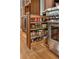 Gourmet kitchen with stainless steel oven, wood cabinets and pull out storage at 4094 Norton Se Pl, Smyrna, GA 30082