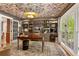 Sophisticated home office with custom built-ins, hardwood floors, and designer wallpaper at 4094 Norton Se Pl, Smyrna, GA 30082