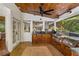 Outdoor kitchen with grill, countertops, wood ceiling and flooring at 4094 Norton Se Pl, Smyrna, GA 30082