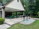 Covered picnic area featuring picnic tables, barbecue grills and an outdoor space for gatherings at 602 Springharbor Dr, Woodstock, GA 30188