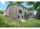 Spacious backyard with a raised deck, stairs, and landscaped yard at 429 Gold Xing, Canton, GA 30114
