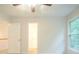Bright bedroom featuring a ceiling fan, and natural light from the window at 429 Gold Xing, Canton, GA 30114