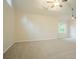Well-lit bedroom featuring a ceiling fan, carpeted floors, and natural light at 429 Gold Xing, Canton, GA 30114