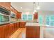 Charming kitchen with stainless steel appliances, granite countertops, and pendant lighting at 429 Gold Xing, Canton, GA 30114