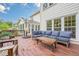 Spacious back deck with comfortable seating, offering an ideal spot for outdoor entertaining at 745 Amberton Close, Suwanee, GA 30024