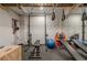 Well-equipped home gym featuring free weights, a mirror, and padded flooring at 745 Amberton Close, Suwanee, GA 30024