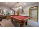 Spacious basement with a pool table, carpeted floors, and recessed lighting at 745 Amberton Close, Suwanee, GA 30024