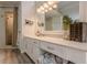 Bathroom with white vanity, double sinks, and a walk-in shower providing ample space and modern amenities at 745 Amberton Close, Suwanee, GA 30024