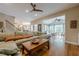Spacious living room open to sunroom and kitchen, perfect for entertaining Gathering and friends at 745 Amberton Close, Suwanee, GA 30024
