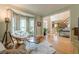 Comfortable living room with hardwood floors, bay windows and an open floor plan at 745 Amberton Close, Suwanee, GA 30024