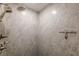 The walk-in shower is beautifully tiled and features modern fixtures for a spa-like experience at 745 Amberton Close, Suwanee, GA 30024