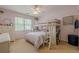 Bright ' bedroom with fun bunk beds, a desk, and playful decor at 1655 Holly Lake Cir, Snellville, GA 30078