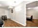 Charming bedroom area featuring wood floors and access to the kitchenette space at 2875 Riverbend Ct, Snellville, GA 30078