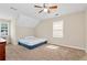 Bedroom with a ceiling fan and neutral walls at 2875 Riverbend Ct, Snellville, GA 30078