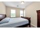 Cozy bedroom featuring neutral walls and natural light at 2875 Riverbend Ct, Snellville, GA 30078